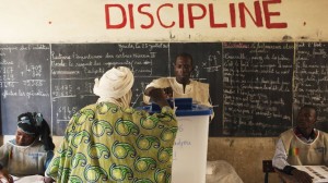 A man casts his vote during Mali's presidential election in Timbuktu